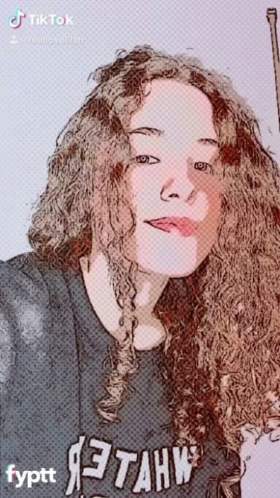 Cute white girl with curly hair shows boobs on TikTok with comic panel filter