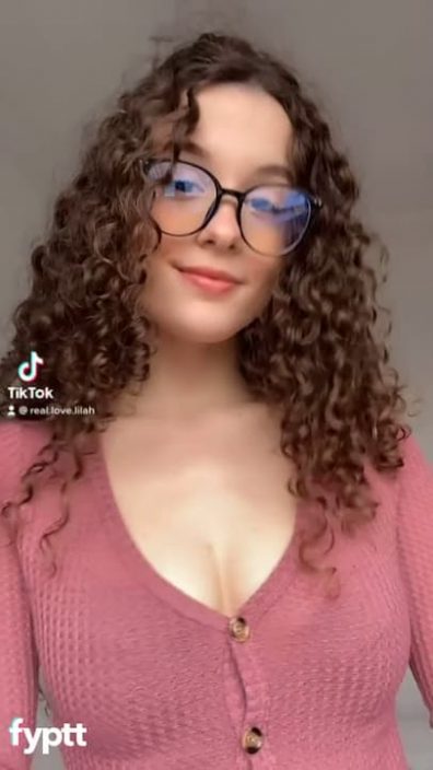 Cute nerd sneezes and show beautiful boobs on TikTok