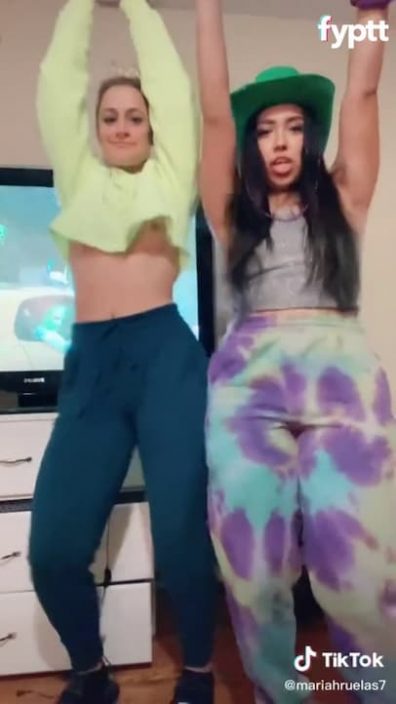 Another girl accidentally shows nip slip while raising hands on sexy TikTok