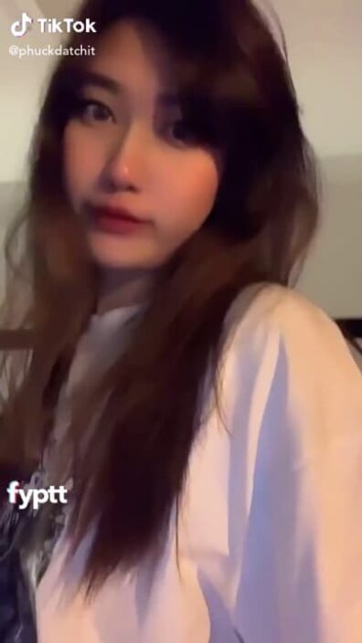 Asian thot hides her brown nipple on TikTok with blur filter