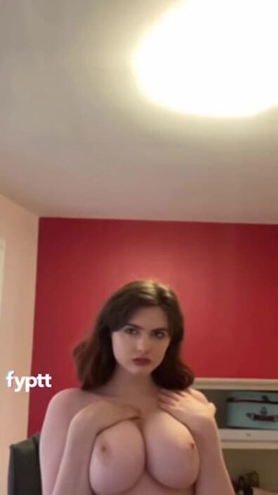 Beautiful brunette girl with super big tits on TikTok gets naked and rides a dildo