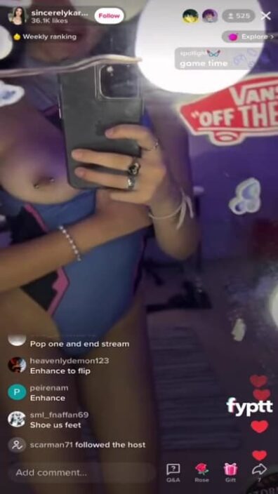 Cosplay girl flashing one of her pierced tits on Live TikTok for her viewers