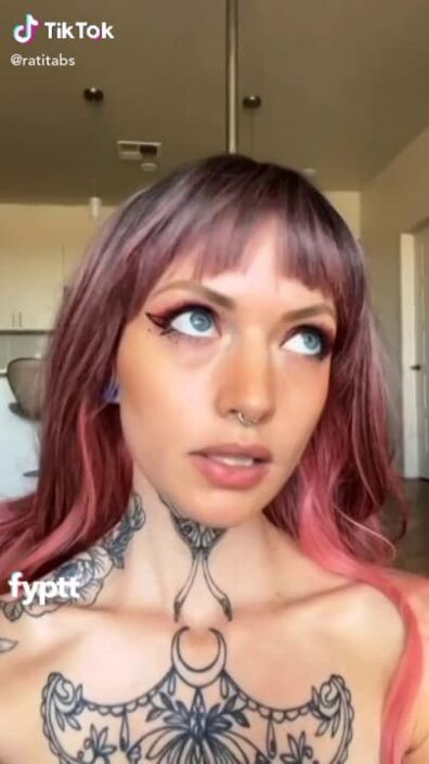 Tattooed girl with big TikTok tits gets naked with cool transitions