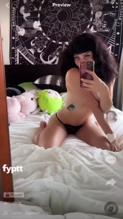 Slim girl with perky TikTok tits took a selfie in front of the mirror