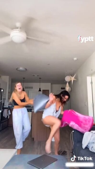 This girl has a pillow fight with a friend and shows multiple sexy nipslips on TikTok because of the loose top
