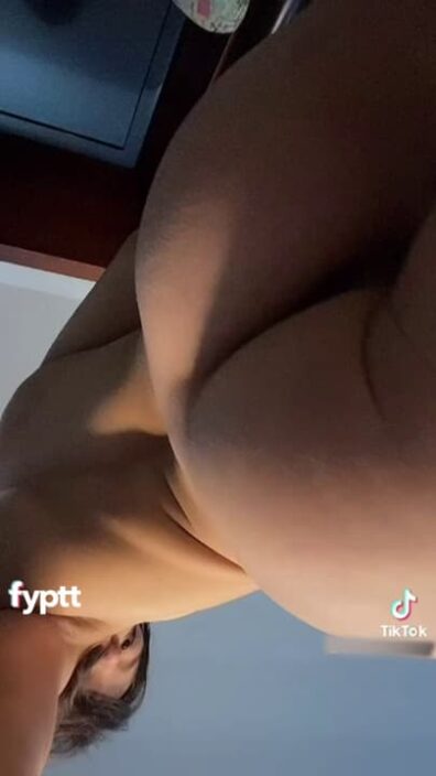 Tiny and naughty fuckable brunette babe gets naked on TikTok