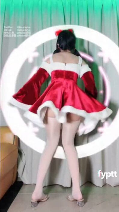 Naughty girl in Santa dress without panties shows her TikTok pussy and ass hole with a buttplug