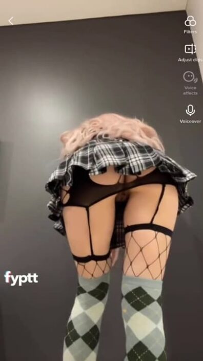 Girl without panties wearing short skirts showing us the rear views of hot NSFW TikTok moves