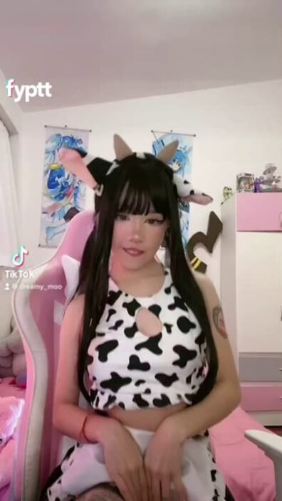 Asian girl in sexy cow print cosplay costume showing her tits on TikTok