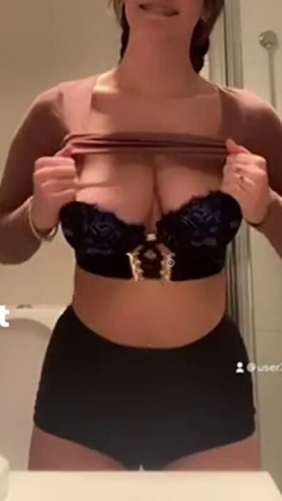 TikTok thot with french braids and braces pulls down her top to reveal juicy knockers